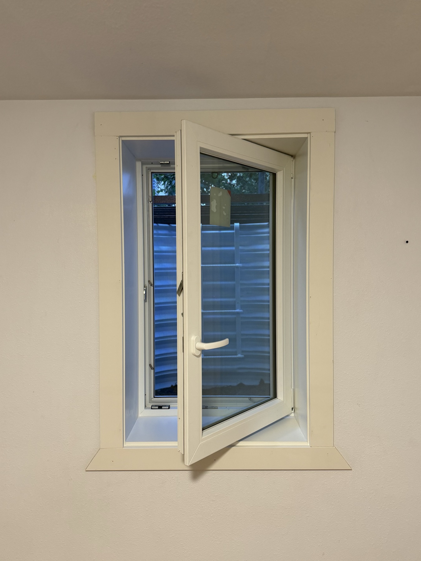 Egress window interior view open casement Colorado