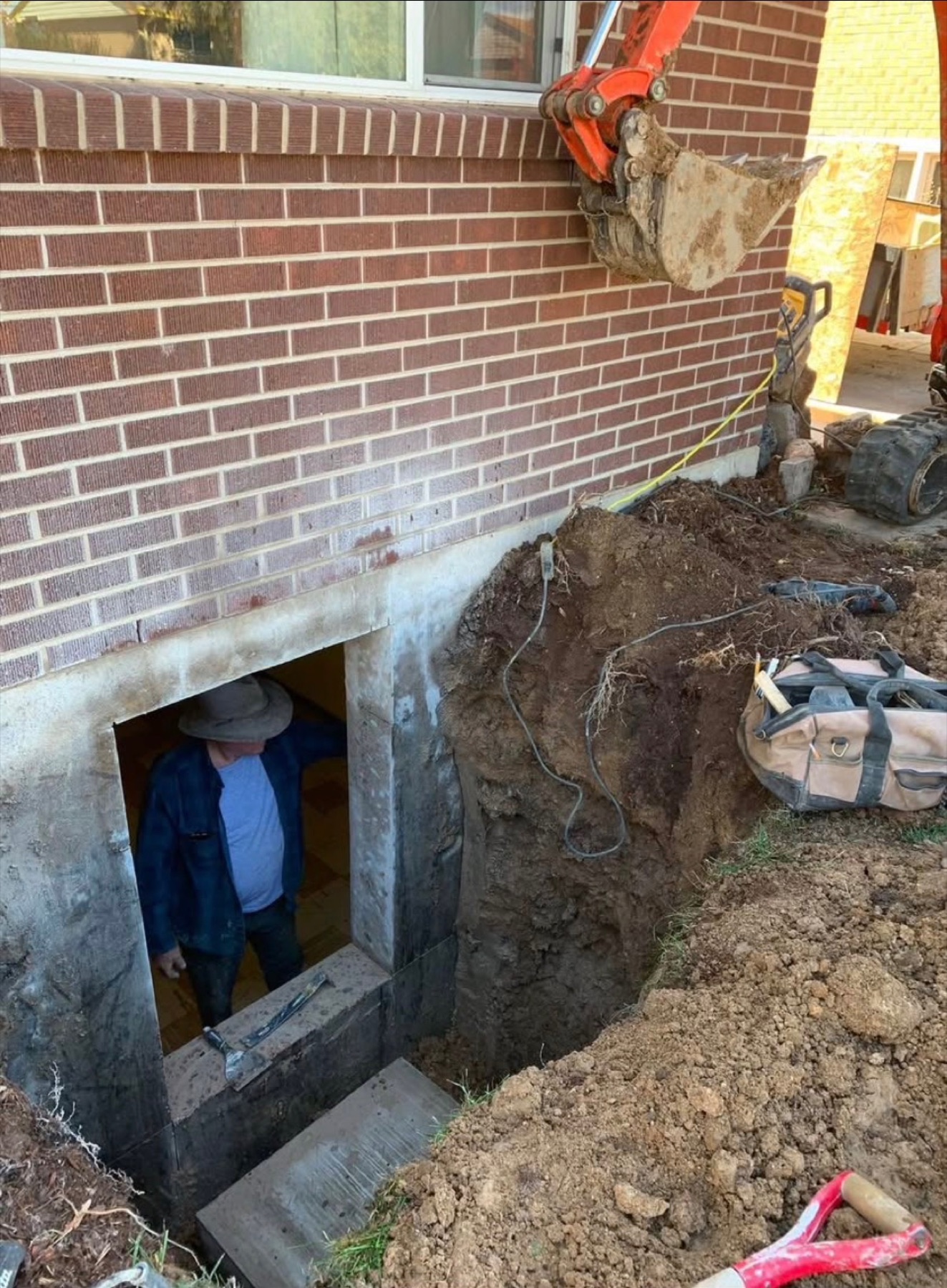 Egress window excavation opening in progress Colorado