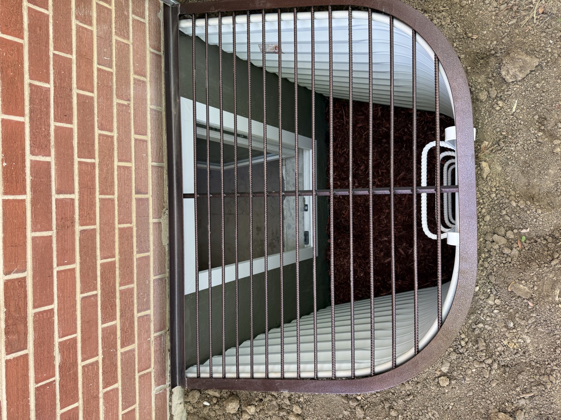 Egress window well rebar grate cover top view Colorado