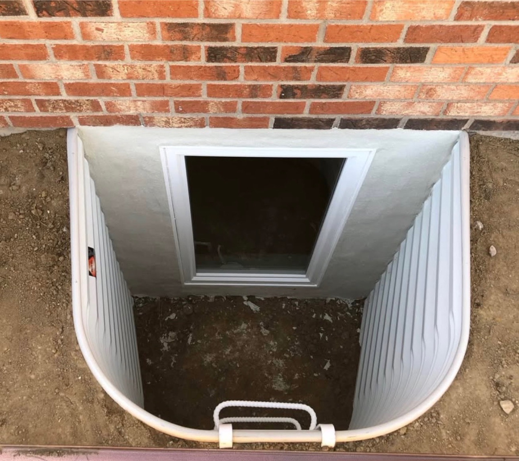 New egress window install with corrugated well Denver